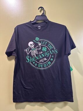 St. Patrick Black Tee with Green Shamrock Skeleton Graphic